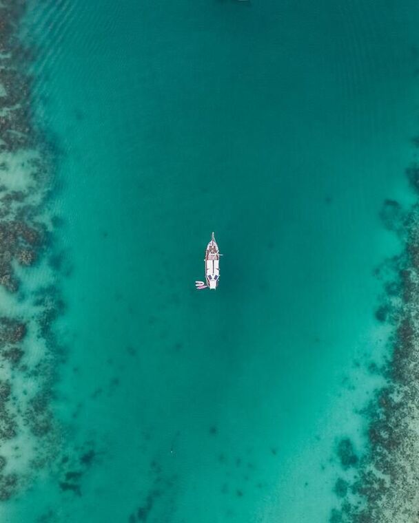 yacht in turquoise sea